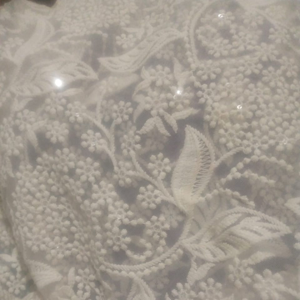 Unstiched floral suit cloths