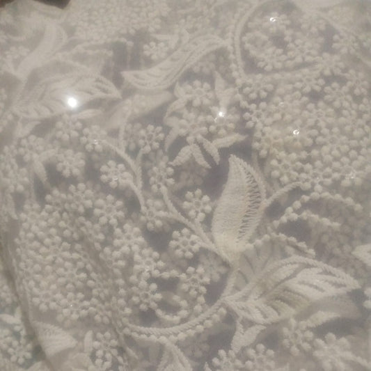 Unstiched floral suit cloths